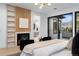 Elegant main bedroom with fireplace and access to balcony at 1126 S Garfield St, Denver, CO 80210