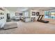 Finished basement with sectional sofa, home gym, and lots of natural light at 415 S Snowmass Cir, Superior, CO 80027