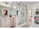 Spa-like bathroom with walk-in shower, double vanity, and modern fixtures at 415 S Snowmass Cir, Superior, CO 80027