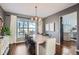 Spacious dining room with large windows and a chandelier at 415 S Snowmass Cir, Superior, CO 80027