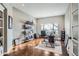 Home office with hardwood floors and built-in shelving at 415 S Snowmass Cir, Superior, CO 80027