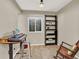 The finished basement office or music room features a large window and neutral walls at 1297 Black Haw St, Elizabeth, CO 80107