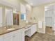 Elegant bathroom with double sinks, granite countertops, and a separate glass-enclosed shower at 1297 Black Haw St, Elizabeth, CO 80107