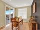 Bright dining area with sliding doors leading to the outdoor patio, showcasing natural light at 1297 Black Haw St, Elizabeth, CO 80107