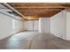 Spacious unfinished basement with concrete floors and exposed ceiling, ready for customization at 15851 Josephine Cir, Brighton, CO 80602