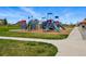 Community playground with various climbing structures, slides, and a gazebo for sunny days at 15851 Josephine Cir, Brighton, CO 80602