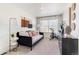 Comfortable bedroom setup with decor and a nice window at 18714 E 99Th Ave, Commerce City, CO 80022