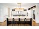 Spacious kitchen with large island, modern appliances, and ample cabinet space at 2400 S Columbine St, Denver, CO 80210