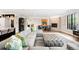 Spacious living room with a stone fireplace, modern furniture, and plenty of natural light at 2400 S Columbine St, Denver, CO 80210