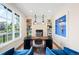 Bright home office with large window, custom built-ins, and modern furnishings at 2400 S Columbine St, Denver, CO 80210
