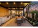 Outdoor kitchen with grill, dining area, and modern design, perfect for entertaining at 2400 S Columbine St, Denver, CO 80210