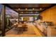 Beautifully designed outdoor patio with dining area, grill, and hot tub at 2400 S Columbine St, Denver, CO 80210