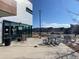 Exterior view of Atlas Coffee, highlighting outdoor seating and modern architectural design at 8984 Eagle River St, Littleton, CO 80125