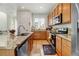 Well-equipped kitchen with granite countertops and ample cabinet space at 8984 Eagle River St, Littleton, CO 80125