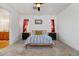 Bright and airy main bedroom with carpeted floor and ceiling fan at 8984 Eagle River St, Littleton, CO 80125