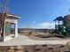 Community playground featuring slides, climbing structures, and open space for children at 8984 Eagle River St, Littleton, CO 80125