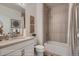 Well-lit bathroom features a combination shower and tub, modern fixtures, and neutral decor at 920 W 128Th Pl, Westminster, CO 80234