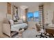 Charming secondary bedroom with modern workstation and large window offering scenic views at 920 W 128Th Pl, Westminster, CO 80234