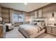 Serene bedroom featuring a king-size bed, stylish curtains, and coordinating bedside tables for a comfortable retreat at 920 W 128Th Pl, Westminster, CO 80234