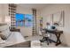Stylish secondary bedroom with modern workstation and large window offering scenic views at 920 W 128Th Pl, Westminster, CO 80234
