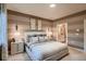Inviting bedroom with elegant striped walls, plush bedding, and modern nightstands for a relaxing atmosphere at 920 W 128Th Pl, Westminster, CO 80234