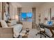 Bright, modern home office space with a comfortable daybed and a view of the outdoors at 920 W 128Th Pl, Westminster, CO 80234