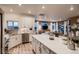 Bright, white kitchen with stainless steel appliances and large island, perfect for entertaining and everyday living at 920 W 128Th Pl, Westminster, CO 80234