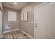 Functional laundry area with modern decor, stylish flooring, and convenient utility connections at 920 W 128Th Pl, Westminster, CO 80234