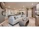 Elegant living room with open layout, modern decor, and dining area perfect for entertaining and Gathering gatherings at 920 W 128Th Pl, Westminster, CO 80234