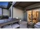 Charming covered patio featuring outdoor furniture, ideal for relaxing and enjoying the view at 920 W 128Th Pl, Westminster, CO 80234