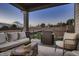 Cozy covered patio with comfortable seating, perfect for outdoor relaxation and enjoying the neighborhood views at 920 W 128Th Pl, Westminster, CO 80234