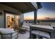 Inviting outdoor patio with comfortable seating and scenic sunset views, perfect for relaxing and entertaining at 920 W 128Th Pl, Westminster, CO 80234
