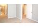 Carpeted bedroom with access to other rooms and bath at 804 Summer Hawk Dr # 9106, Longmont, CO 80504