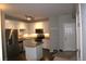 Modern kitchen with stainless steel appliances and granite countertops at 804 Summer Hawk Dr # 9106, Longmont, CO 80504