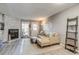 Living room boasts a cozy fireplace, neutral tones, and modern furnishings at 1068 Milo Cir # A, Lafayette, CO 80026