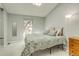 Bright main bedroom featuring vaulted ceilings, skylights, and a walk-in closet with shelving at 1068 Milo Cir # A, Lafayette, CO 80026