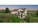 Sprawling backyard with multiple seating areas, perfect for outdoor entertaining at 1091 Colt Cir, Castle Rock, CO 80109