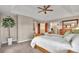 Main bedroom featuring carpet floors, neutral paint, and large windows at 1091 Colt Cir, Castle Rock, CO 80109