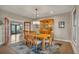 Traditional dining room boasts a chandelier, wood table set, and hutch at 1091 Colt Cir, Castle Rock, CO 80109