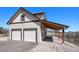 Two-story home with a two-car garage and gravel landscaping at 1091 Colt Cir, Castle Rock, CO 80109