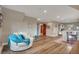 Spacious living room featuring modern vinyl flooring and a cozy seating area at 1091 Colt Cir, Castle Rock, CO 80109