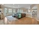 Bright living room with hardwood floors and views of the trees at 1091 Colt Cir, Castle Rock, CO 80109
