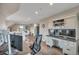Bright office with built-in shelving, desk, and modern vinyl flooring at 1091 Colt Cir, Castle Rock, CO 80109