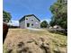 Exterior backyard view featuring a concrete patio, spacious yard, and privacy fencing for outdoor enjoyment at 4178 E 94Th Pl, Thornton, CO 80229