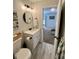 This is an updated bathroom featuring modern fixtures and bright lighting at 4178 E 94Th Pl, Thornton, CO 80229