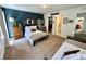 Inviting bedroom featuring a full bed with decor and an organized closet at 4178 E 94Th Pl, Thornton, CO 80229