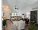 Open-concept living room boasting hardwood floors, a neutral color palette, and ample natural light for comfortable living at 4178 E 94Th Pl, Thornton, CO 80229