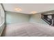 Expansive living area with carpet and neutral walls, ideal for entertaining at 389 Smith Cir, Erie, CO 80516