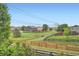 Picturesque neighborhood view showcasing green spaces and well-maintained homes at 389 Smith Cir, Erie, CO 80516