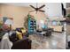 Cozy living room with lots of decorations, hardwood floors, and great natural light at 2321 Ance St, Strasburg, CO 80136